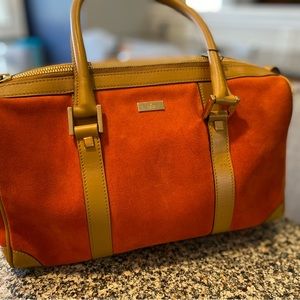 Gucci purse. Orange in color.